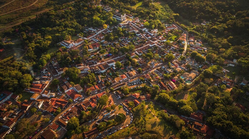 What are the ongoing costs of owning a home in Brazil (taxes, condo fees)?