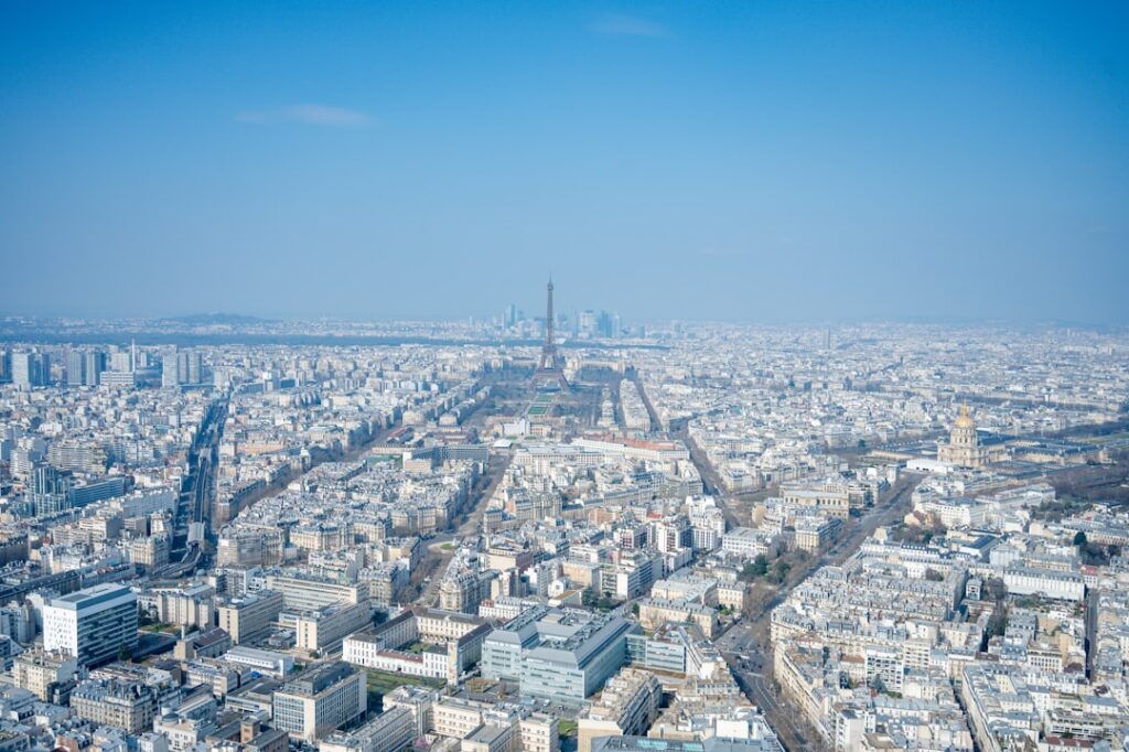 Aerial view of a vast, sprawling city.